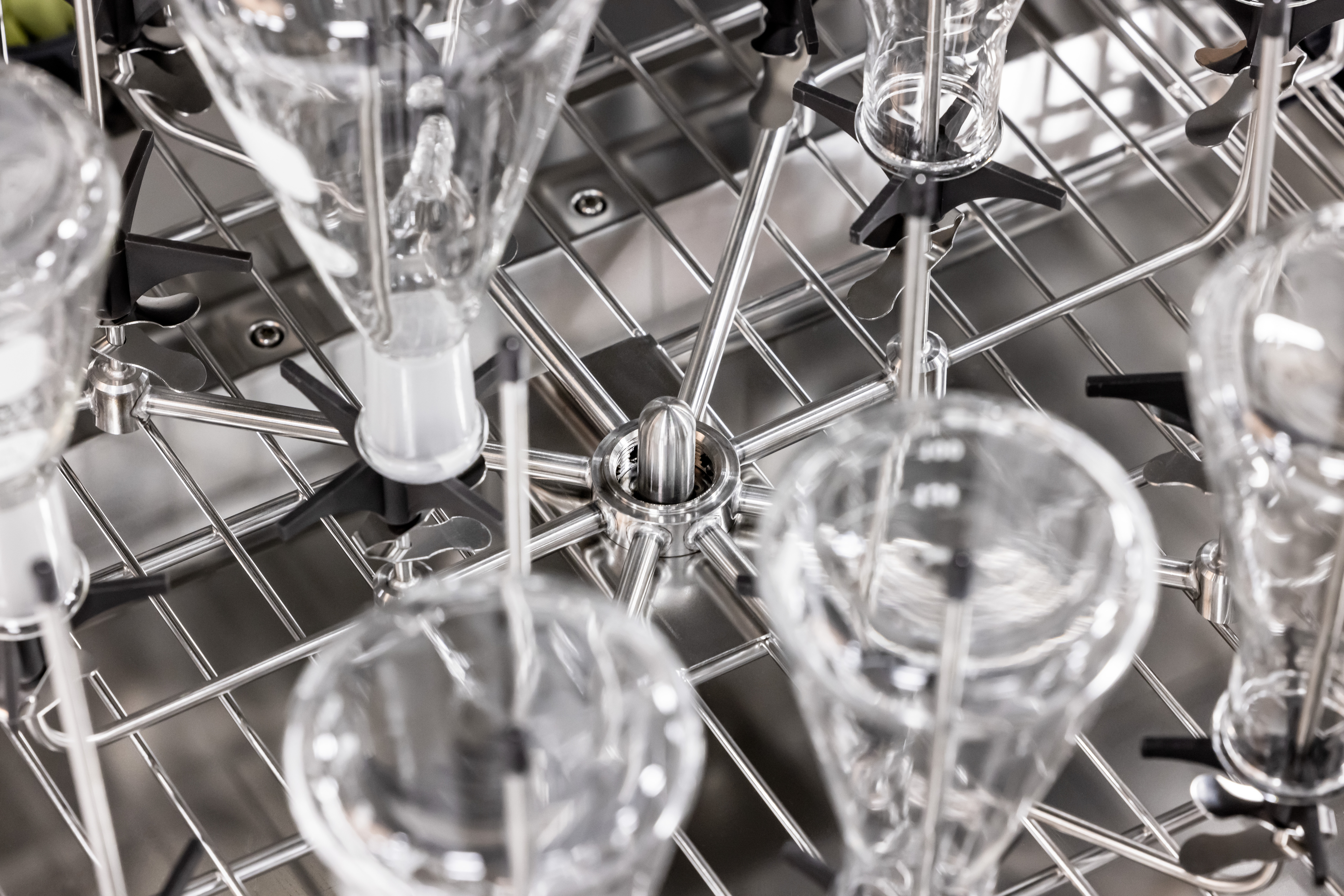 Up-close shot of flasks in the Hotpack IonWash glassware washer.