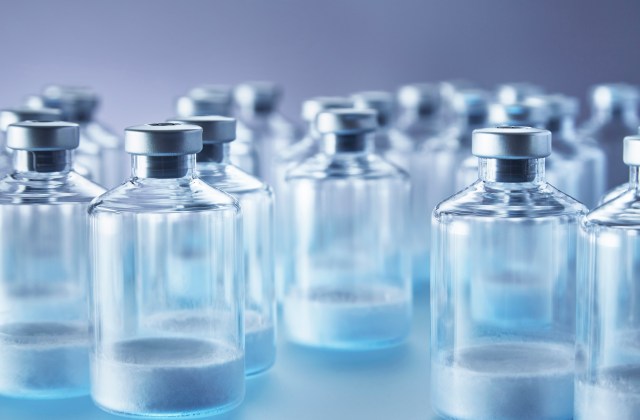 A collection and empty glass vials with a blueish tint.