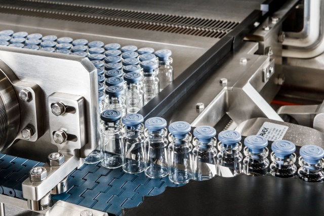 Glass vials in a line.